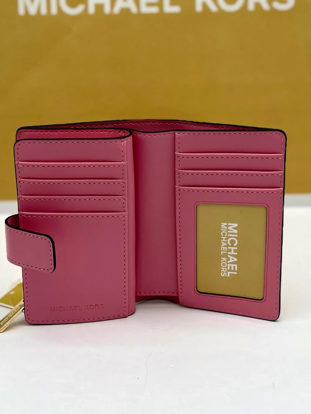 MICHAEL KORS Jet Set Travel Medium Logo Debossed Billfold Wallet carnation